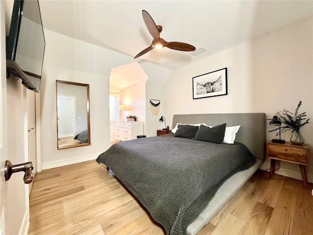 1570 Oakford Rd, Sarasota, FL 34240 - bedroom featuring light wood-type flooring, baseboards, ceiling fan, and lofted ceiling