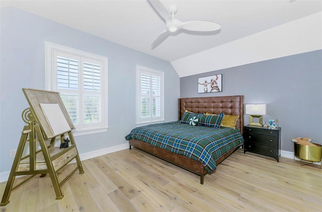 1570 Oakford Rd, Sarasota, FL 34240 - bedroom with wood finished floors, baseboards, lofted ceiling, and ceiling fan