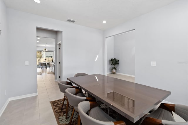 3121 Buffington Pl, Oviedo, FL 32765 - dining room with light tile patterned floors, recessed lighting, and baseboards