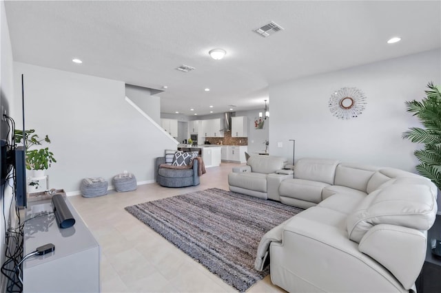 3121 Buffington Pl, Oviedo, FL 32765 - living room featuring recessed lighting and stairs