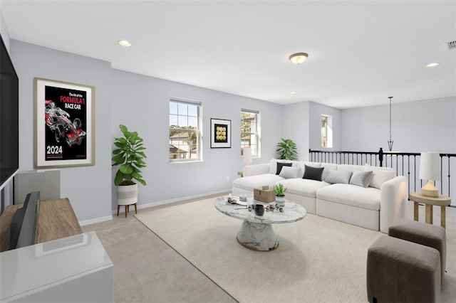3121 Buffington Pl, Oviedo, FL 32765 - living area with light colored carpet, a chandelier, recessed lighting, and baseboards