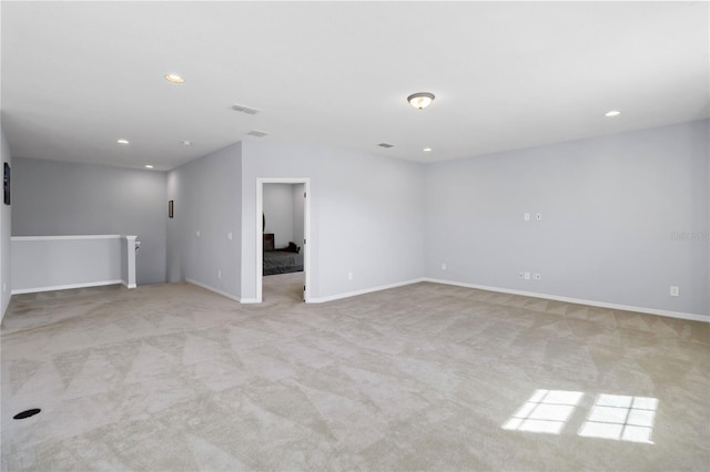3121 Buffington Pl, Oviedo, FL 32765 - empty room featuring light colored carpet, recessed lighting, and baseboards
