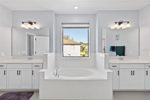 3121 Buffington Pl, Oviedo, FL 32765 - full bathroom with two vanities, a bath, and tile patterned floors
