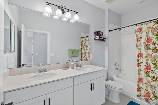 3121 Buffington Pl, Oviedo, FL 32765 - bathroom featuring double vanity, shower / tub combo with curtain, toilet, and tile patterned floors