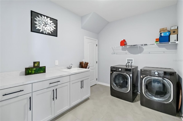 3121 Buffington Pl, Oviedo, FL 32765 - laundry room with separate washer and dryer, cabinet space, and baseboards