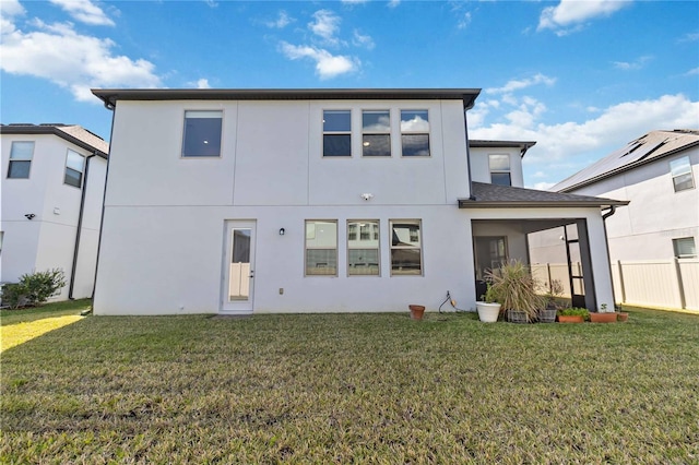 3121 Buffington Pl, Oviedo, FL 32765 - rear view of house with stucco siding and a sunroom
