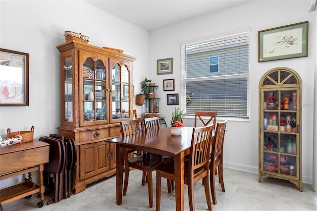 5052 Blanchard Ct, Saint Cloud, FL 34772 - dining area featuring light tile patterned floors and baseboards