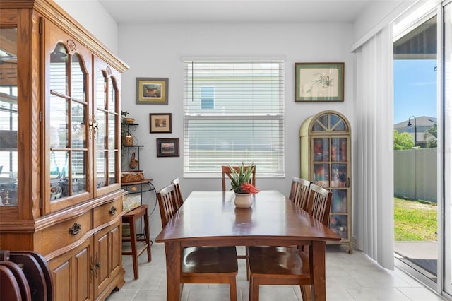 5052 Blanchard Ct, Saint Cloud, FL 34772 - dining room featuring light tile patterned flooring