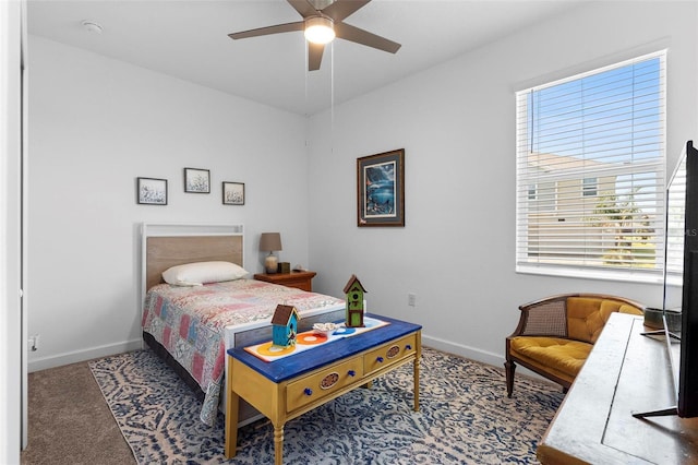5052 Blanchard Ct, Saint Cloud, FL 34772 - bedroom with baseboards, carpet, and a ceiling fan