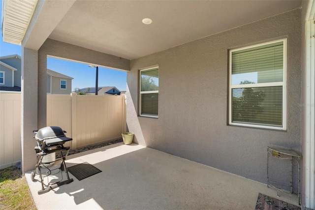 5052 Blanchard Ct, Saint Cloud, FL 34772 - view of patio / terrace featuring grilling area and fence