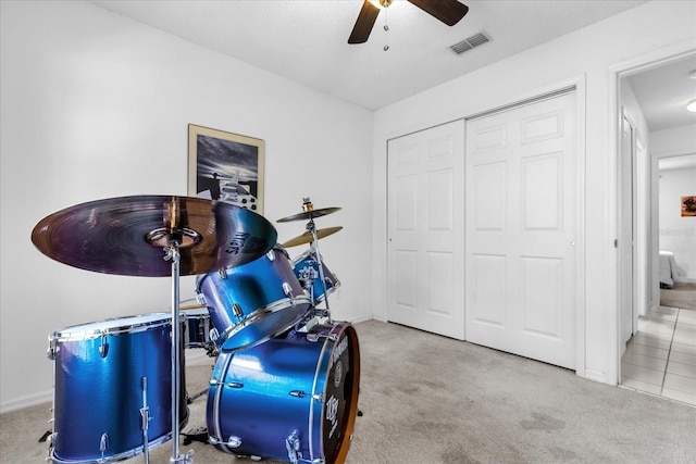 10400 Hunters Trail Ct, Orlando, FL 32817 - workout area featuring visible vents, baseboards, a ceiling fan, and carpet flooring