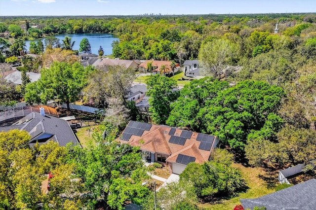 10400 Hunters Trail Ct, Orlando, FL 32817 - bird's eye view featuring a wooded view and a water view