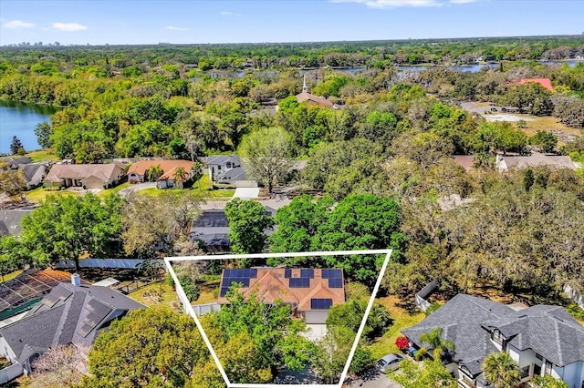 10400 Hunters Trail Ct, Orlando, FL 32817 - birds eye view of property with a residential view, a view of trees, and a water view