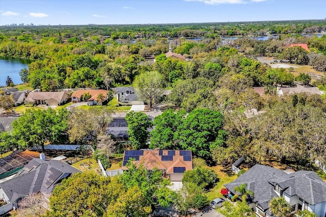 10400 Hunters Trail Ct, Orlando, FL 32817 - birds eye view of property with a residential view, a water view, and a wooded view