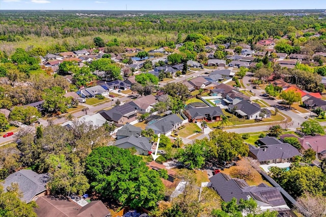 10400 Hunters Trail Ct, Orlando, FL 32817 - birds eye view of property with a residential view and a forest view