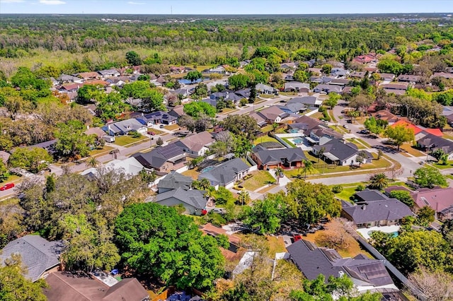 10400 Hunters Trail Ct, Orlando, FL 32817 - birds eye view of property with a wooded view and a residential view