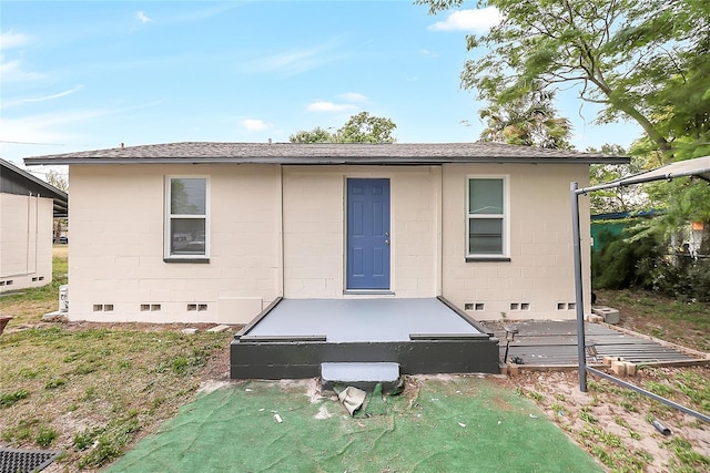 626 Marvin C Zanders Ave, Apopka, FL 32703 - rear view of house with concrete block siding