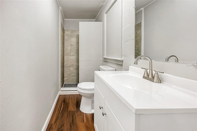626 Marvin C Zanders Ave, Apopka, FL 32703 - bathroom featuring vanity, wood finished floors, baseboards, a shower stall, and toilet
