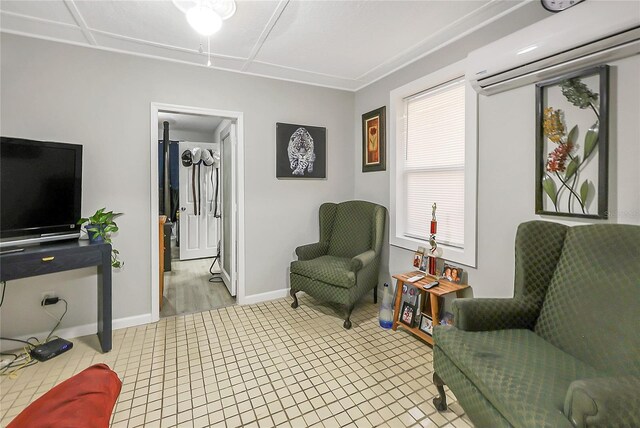 626 Marvin C Zanders Ave, Apopka, FL 32703 - sitting room with a wall unit AC and baseboards