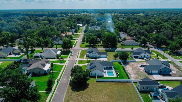311 W Delaware Ave, Lake Helen, FL 32744 - aerial perspective of suburban area featuring a forest