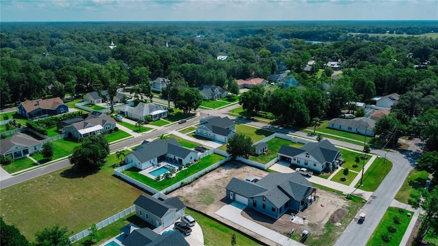 311 W Delaware Ave, Lake Helen, FL 32744 - aerial view of residential area featuring a forest