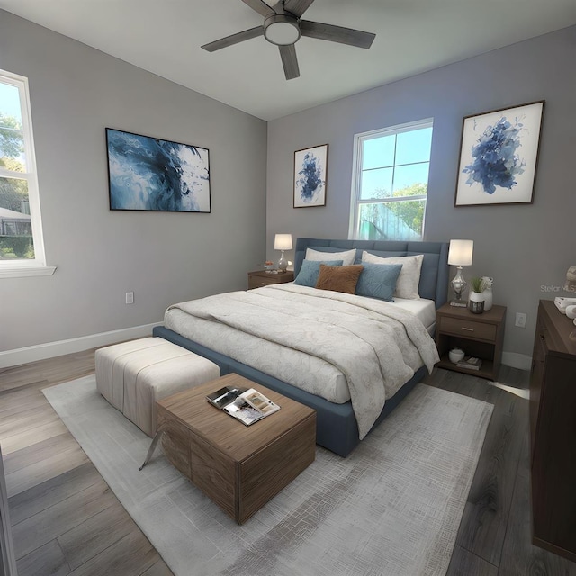 311 W Delaware Ave, Lake Helen, FL 32744 - bedroom featuring baseboards, wood finished floors, and ceiling fan