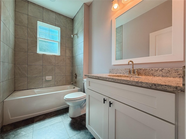 311 W Delaware Ave, Lake Helen, FL 32744 - full bathroom featuring vanity, toilet, washtub / shower combination, and tile patterned flooring