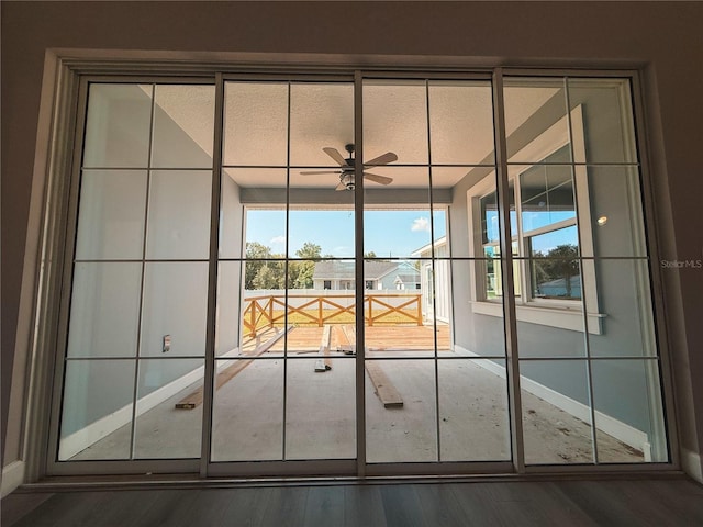 311 W Delaware Ave, Lake Helen, FL 32744 - detailed view of wood finished floors, ceiling fan, and baseboards