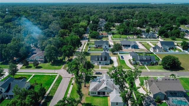 311 W Delaware Ave, Lake Helen, FL 32744 - aerial view of residential area featuring a heavily wooded area