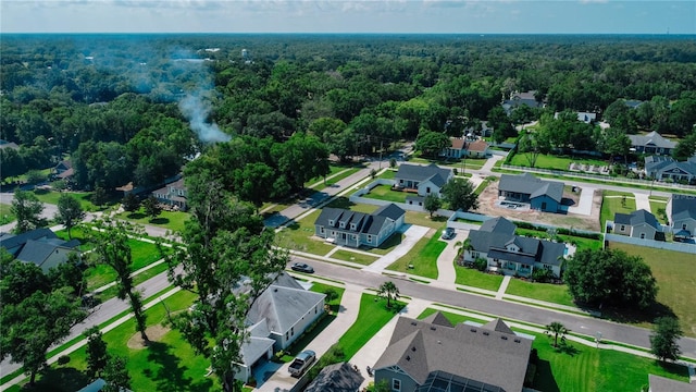 311 W Delaware Ave, Lake Helen, FL 32744 - aerial view of property and surrounding area featuring a forest and nearby suburban area