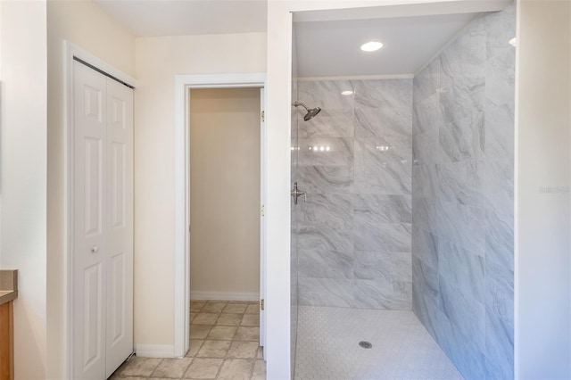 3199 Quail Dr, Deltona, FL 32738 - bathroom with baseboards, a closet, tiled shower, and vanity
