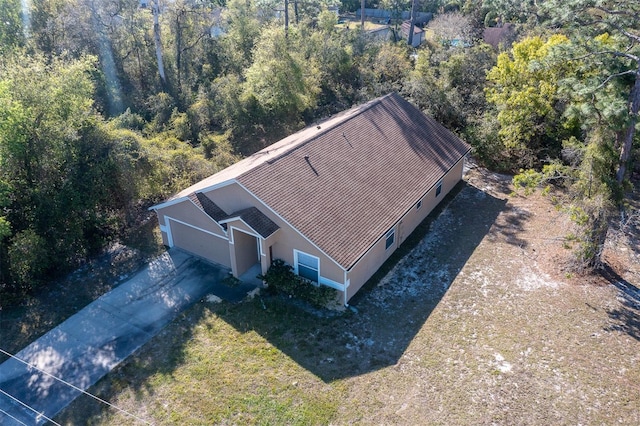 3199 Quail Dr, Deltona, FL 32738 - birds eye view of property featuring a wooded view