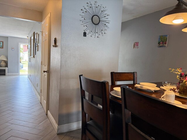 3024 Natoma Way, Orlando, FL 32825 - dining room featuring baseboards