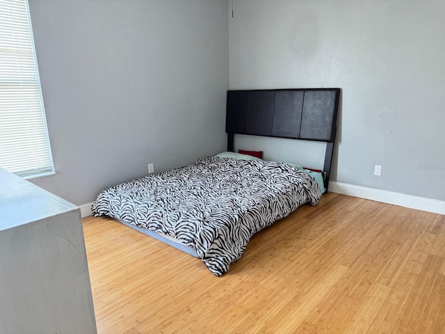 3024 Natoma Way, Orlando, FL 32825 - bedroom featuring wood finished floors and baseboards