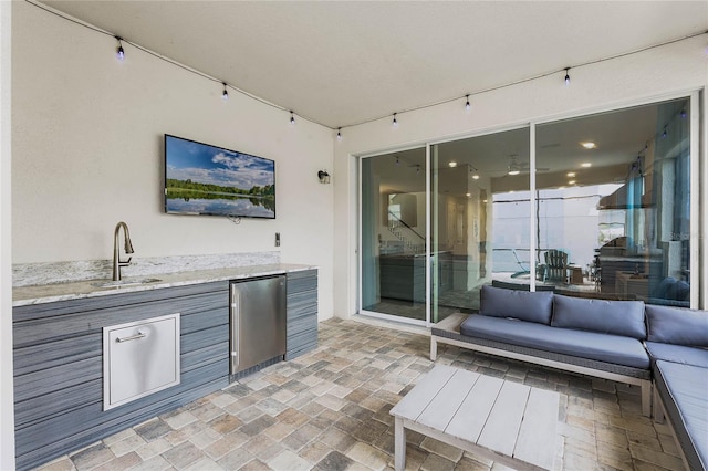 1799 Tropical Palms Cir, Kissimmee, FL 34747 - view of patio with an outdoor hangout area and area for grilling