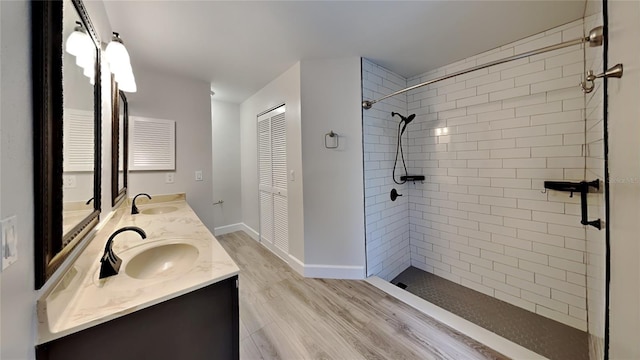 213 Almaden Ct, Winter Springs, FL 32708 - full bath with wood finished floors, tiled shower, and a sink