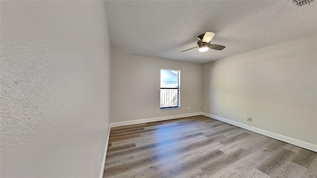 213 Almaden Ct, Winter Springs, FL 32708 - empty room featuring a ceiling fan, wood finished floors, a textured ceiling, baseboards, and a textured wall