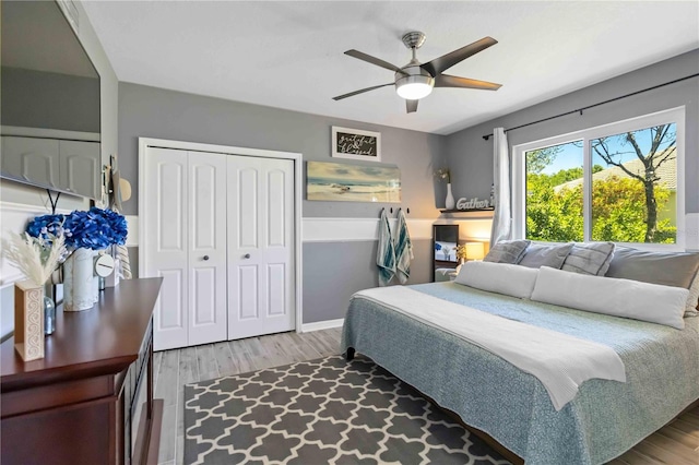13136 Peregrin Cir, Bradenton, FL 34212 - bedroom featuring wood finished floors, ceiling fan, and a closet