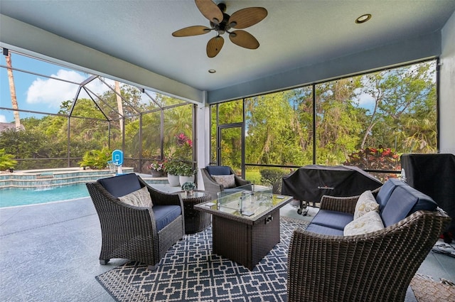 13136 Peregrin Cir, Bradenton, FL 34212 - view of patio / terrace featuring a grill, a ceiling fan, outdoor lounge area, a pool with connected hot tub, and a lanai