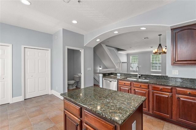 1563 Common Way Rd, Orlando, FL 32814 - kitchen featuring dishwasher, recessed lighting, dark stone counters, a kitchen island, and a chandelier