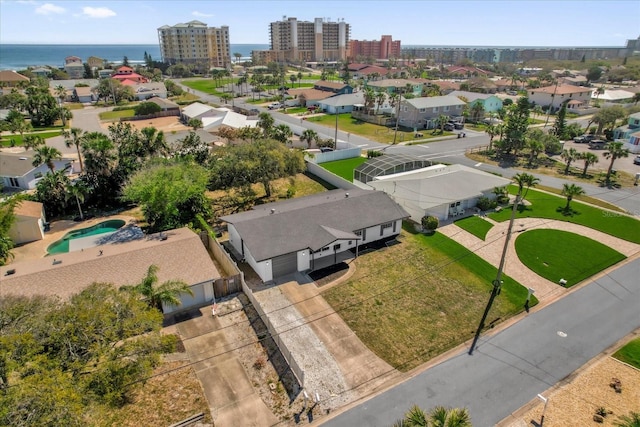 drone / aerial view with a water view and a city view