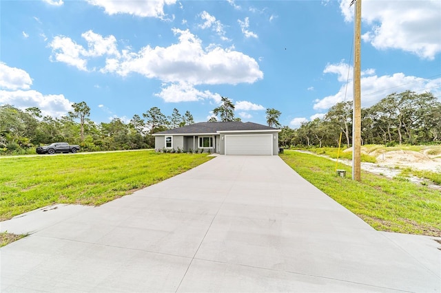 ranch-style house featuring stucco siding, an attached garage, driveway, and a front yard