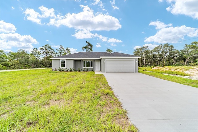 ranch-style home with concrete driveway, stucco siding, a garage, and a front lawn