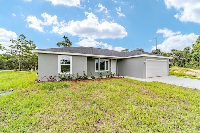 ranch-style home featuring a front lawn, an attached garage, concrete driveway, and stucco siding