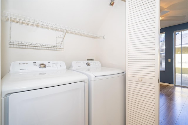 6274 Bristol Channel Way, Orlando, FL 32829 - laundry room with washer and dryer, wood finished floors, and laundry area