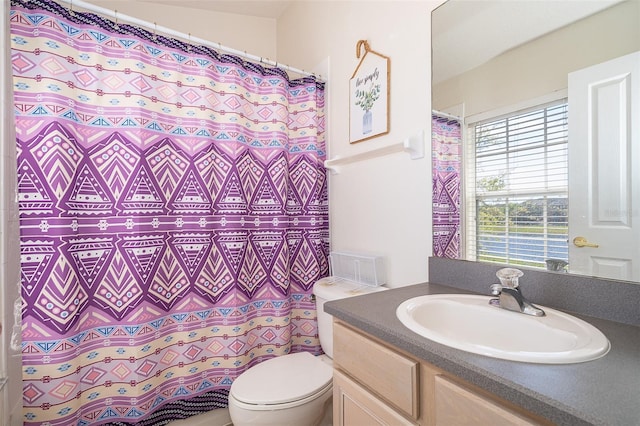 6274 Bristol Channel Way, Orlando, FL 32829 - bathroom with a shower with curtain, toilet, and vanity