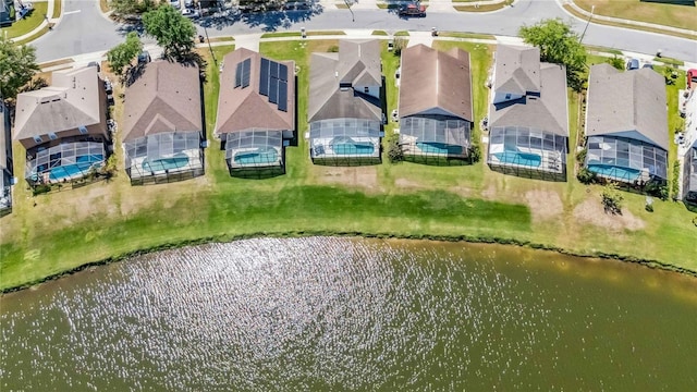 birds eye view of property featuring a residential view and a water view
