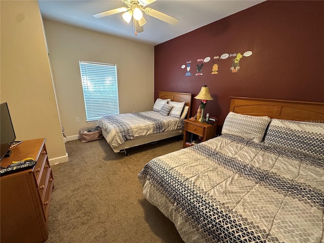 2964 Lucayan Harbour Cir Unit 106, Kissimmee, FL 34746 - bedroom featuring baseboards, carpet, and ceiling fan