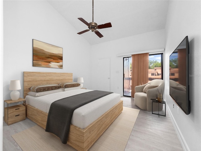 1092 E Michigan St Unit 1, Orlando, FL 32806 - bedroom with access to exterior, high vaulted ceiling, light wood-style flooring, a ceiling fan, and baseboards