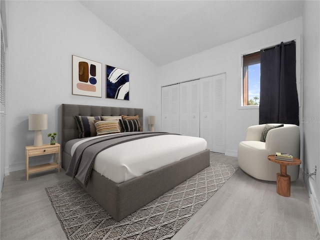 1092 E Michigan St Unit 1, Orlando, FL 32806 - bedroom featuring wood finished floors, vaulted ceiling, a closet, and baseboards